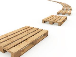 Wooden pallets arranged in a row