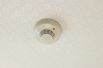 smoke detector on a ceiling