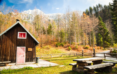 Alpine hut with a bench