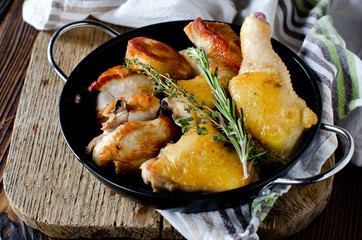Chicken baked with rosemary and thyme