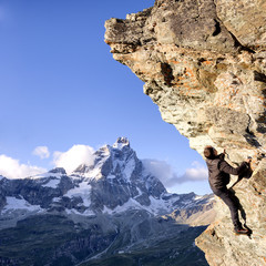 Climber with Matterhorn - Stock Image - 73969978