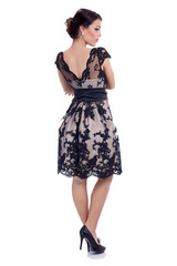 beautiful woman in short dress isolated on white