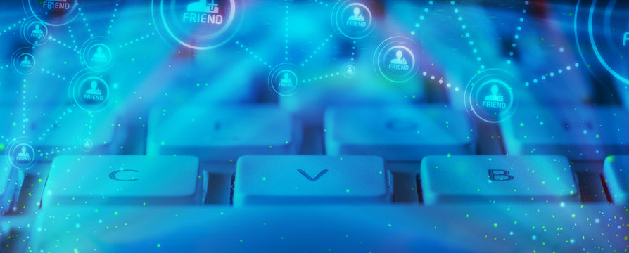 Keyboard with glowing social network icons