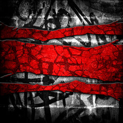 cracked wall with graffiti