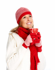Young woman drinking hot tea.