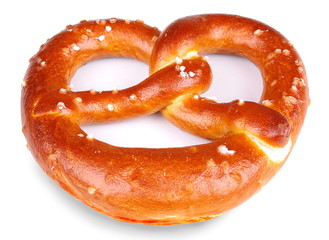 Freshly baked pretzel on white background