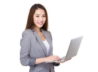 Businesswoman use of notebook