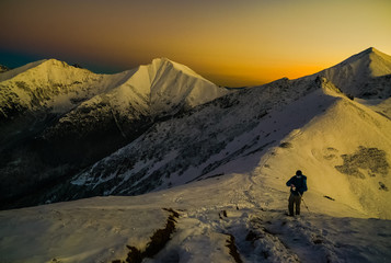 Sunset in mountains above clouds - Tatra Mountains in Poland