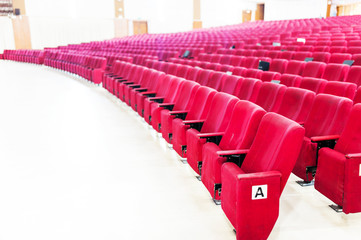 Empty seat on row in thearter closeup