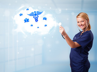Young doctor with abstract cloud and medical icons