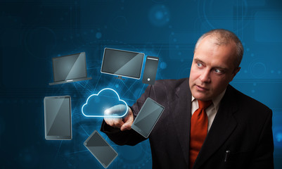 Businessman touching high technology cloud service