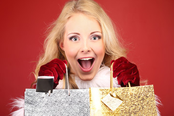 Christmas, woman and gift bags