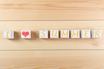I love summer spelled in wooden blocks