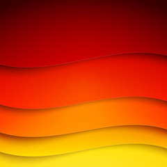 Abstract red, orange and yellow paper wave shapes background