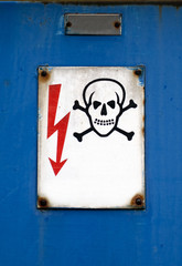 stamp illustration showing danger text and skull