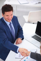 Business people working with laptop in an office