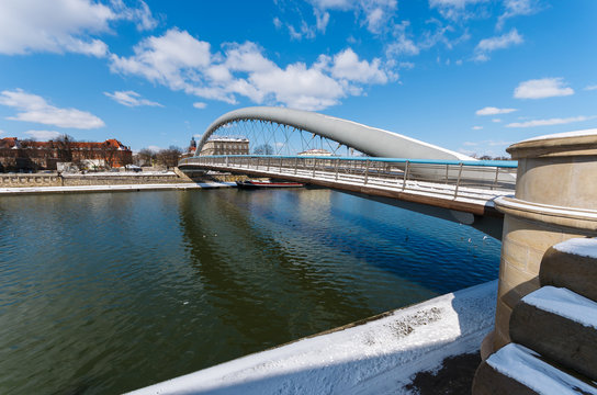 Bernatka bridge on Vistula river in winter, Krakow, Poland