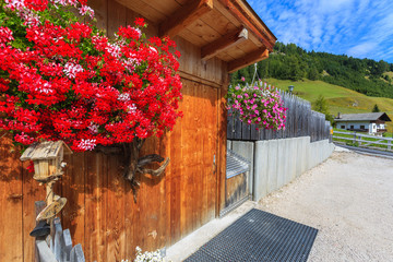 House in alpine village of Colfosco, Dolomites Mountains, Italy