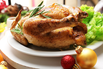 Baked chicken for festive dinner. Christmas table setting