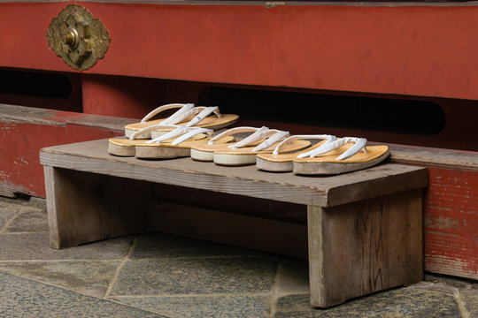 geta sandals left outside Buddhist shrine