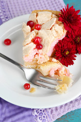 Piece of tasty pie with apples and berry mousse,