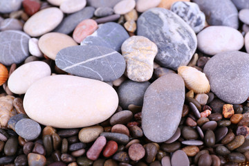 Fototapeta na wymiar Sea stones as background