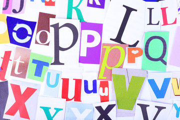 Colorful newspaper letters as background