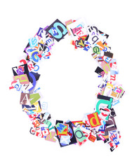 Letter Q made of colorful newspaper letters isolated on white