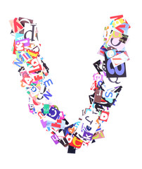 Letter V made of colorful newspaper letters isolated on white