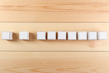 Educational cubes, on wooden background