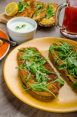Breaded eggplant parmesan and arugula