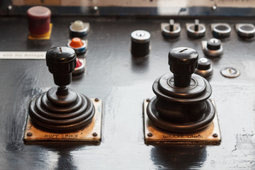 Two analog joysticks on a dashboard © kyrien