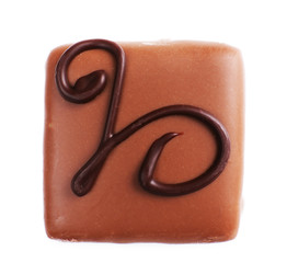 Delicious chocolate candy isolated on white