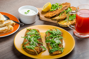 Breaded eggplant parmesan and arugula