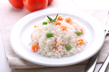 Vegetable rice served on table, close-up
