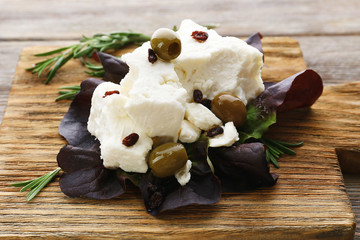 Feta cheese on table