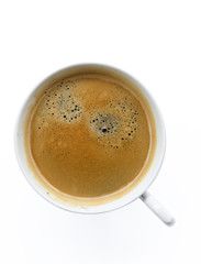 Fresh coffee in white cup,top view