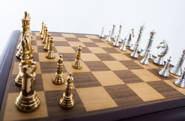Chess set with gold and silver peices.