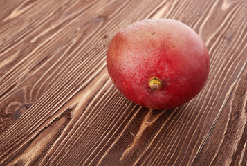 Mango fruit on wood