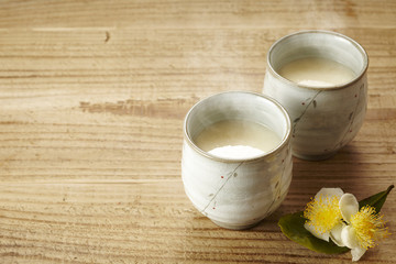 Fototapeta na wymiar 甘酒とお茶の花