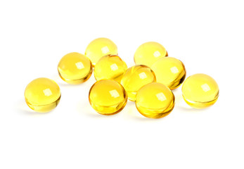 Cod liver oil omega 3 gel capsules on a white background