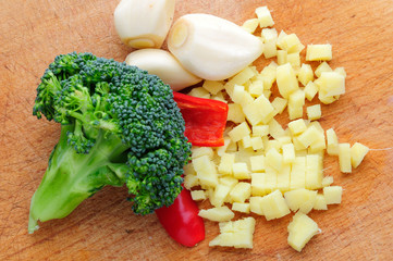 raw broccoli, garlic, gimger, chili pepper