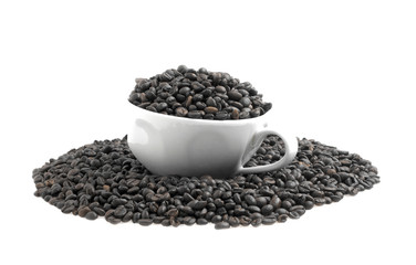 Coffee beans and cup on a white background