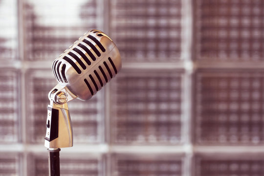 Silver vintage microphone in the studio on outdoor background