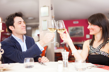 Couple toasting wineglasses