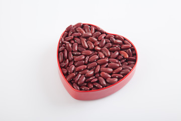 Red kidney beans in heart shape box