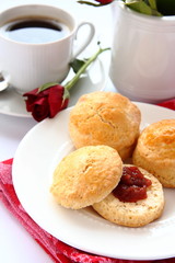 Home made scones with strawberry jam and a cup of tea