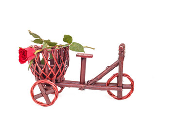 Fototapeta premium Flower in wooden handmade basket isolated on white background