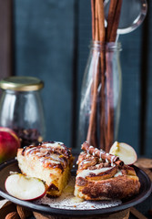 Christmas apple pie with cinnamon and nuts, glaze