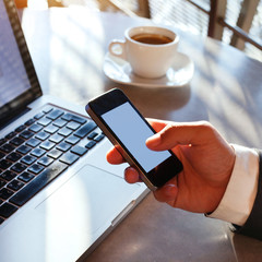 businessman using smartphone with empty screen